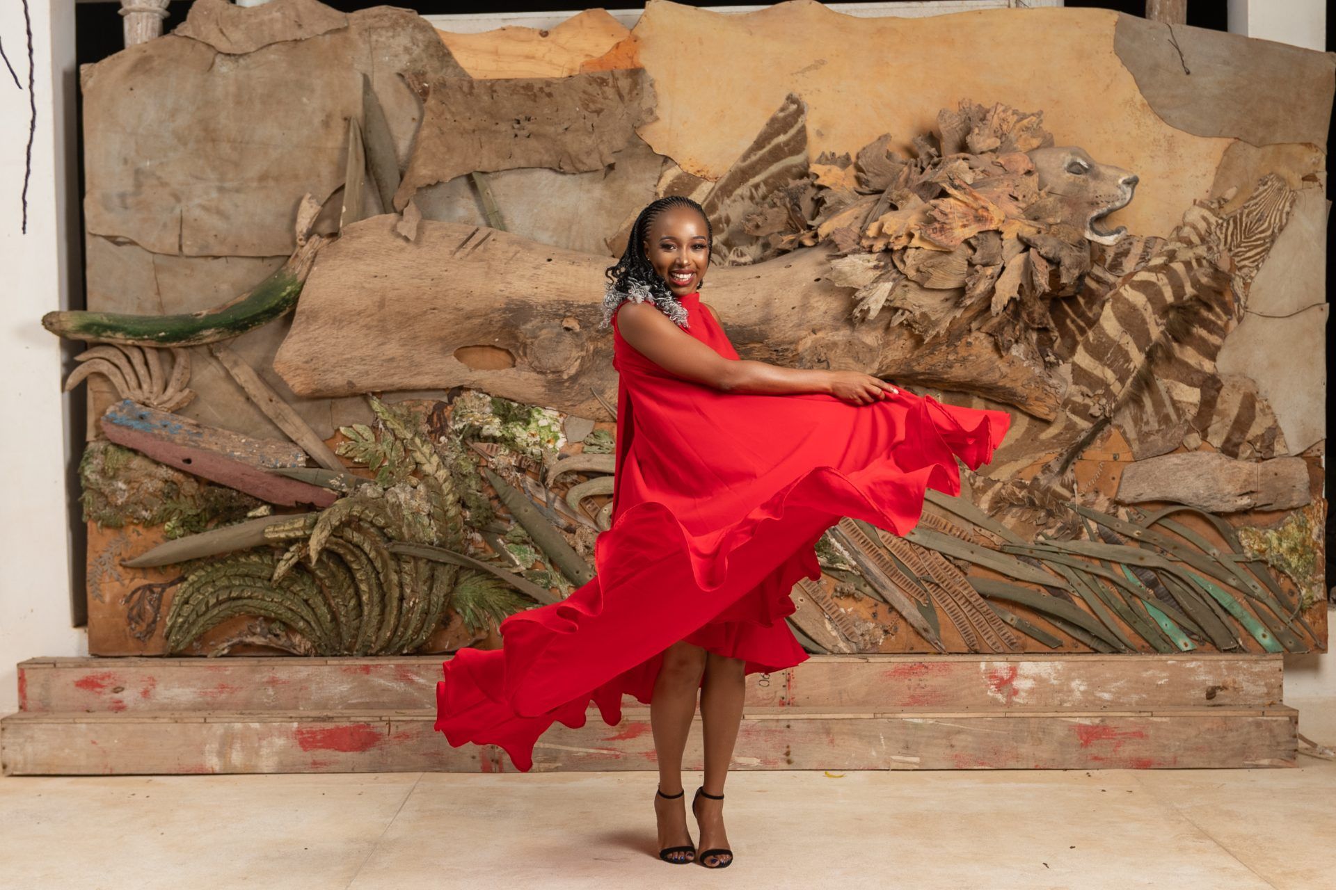 Liz Lenjo in a red gown